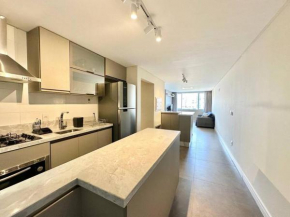 250m da PRAIA Apt 2dorm com Ar cond, box e VISTA MAR